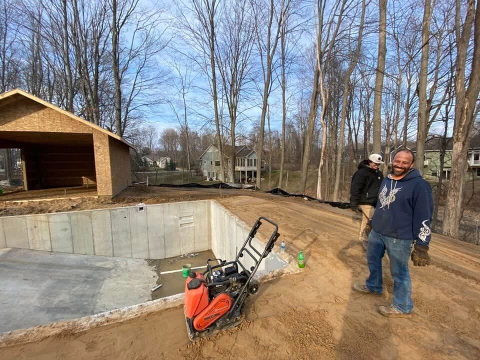 Josh and crew on site at a poured basement foundation